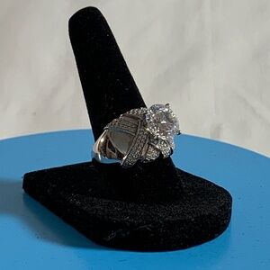 BELLA LUCE  DILLENIUM CUT 6.91CTW ROUND RHODIUM OVER STERLING SILVER RING